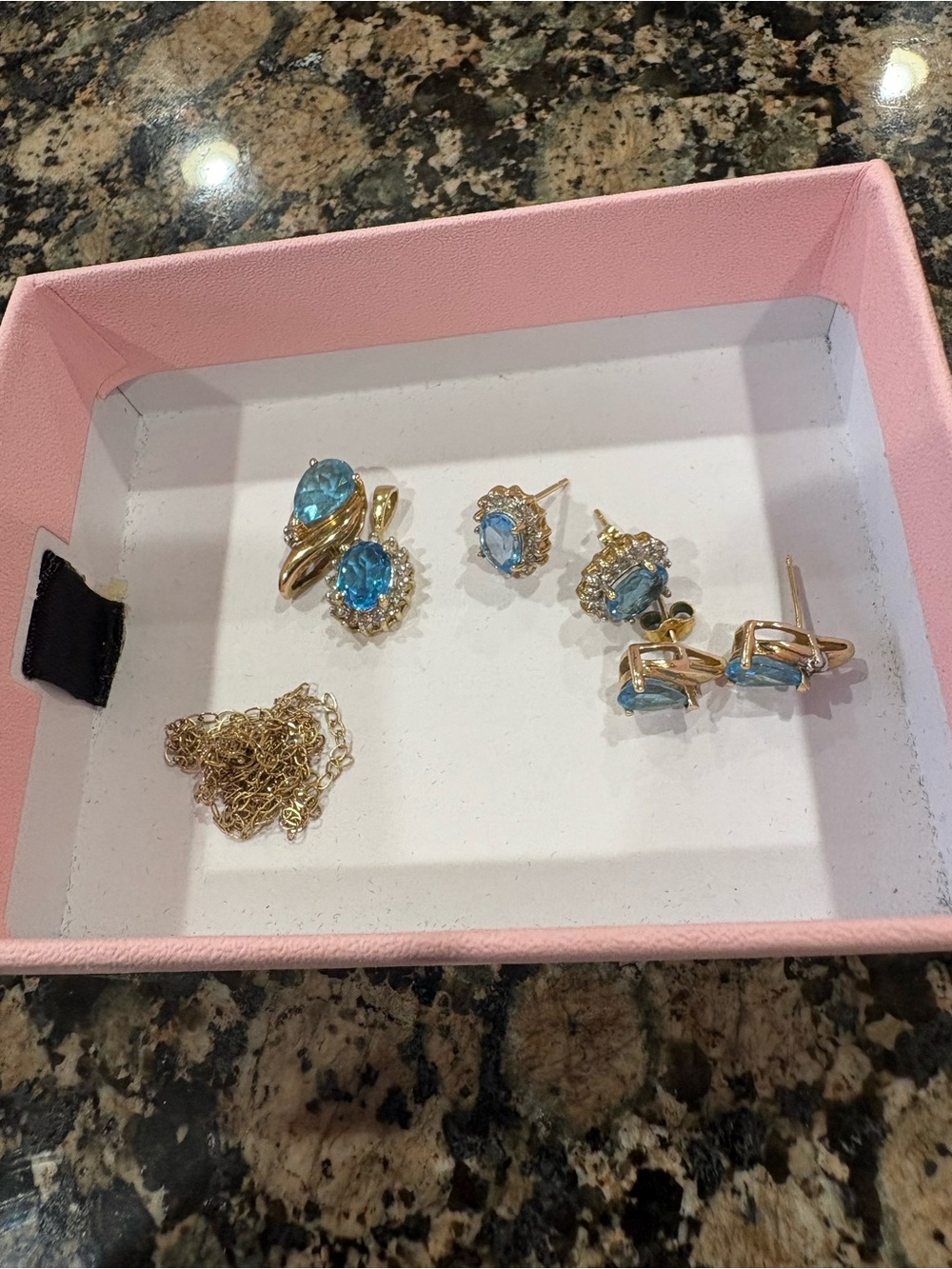 10 Karat Yellow Gold Blue Topaz/ Diamond set